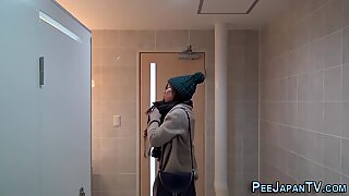 Japanese slut pissing