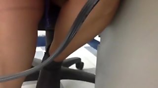 Upskirt under desk 10