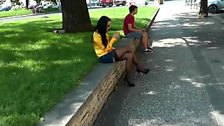 Busty chick in stockings masturbates in the street