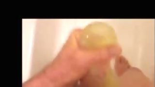 Filling a Condom with Pee and Cum